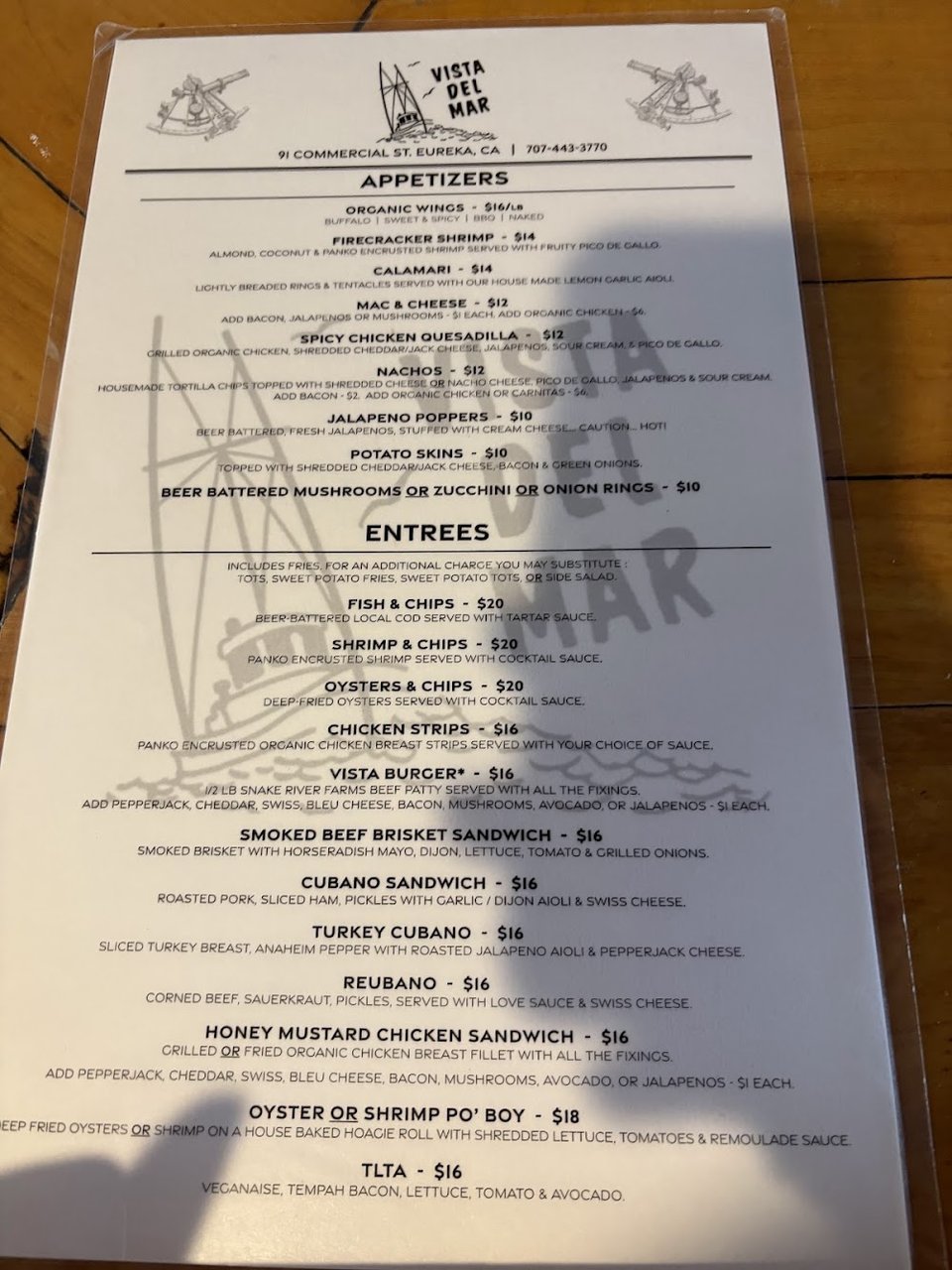 Menu page with tacos and salads.